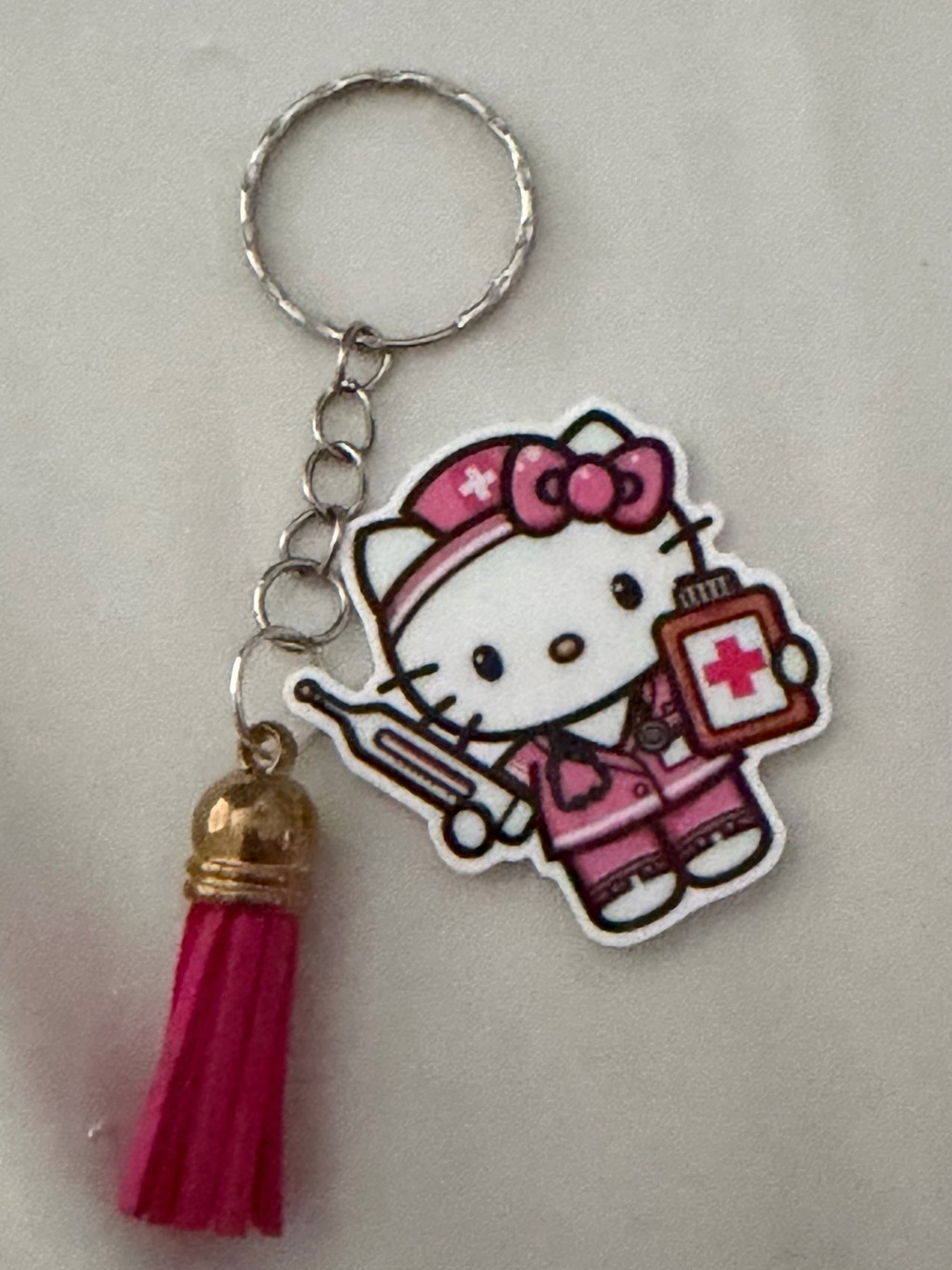 Hello Kitty Pink Nurse Keychain with Fuchsia Tassel
